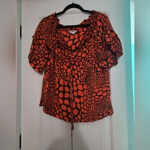 Escapada orange and brown medium top